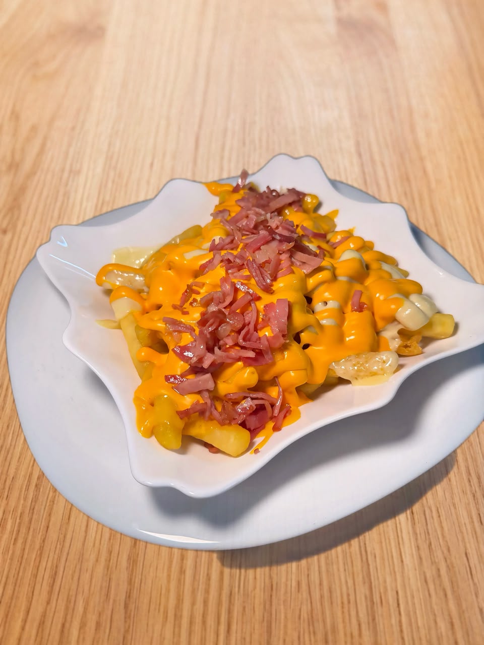 Papas con queso y tocino